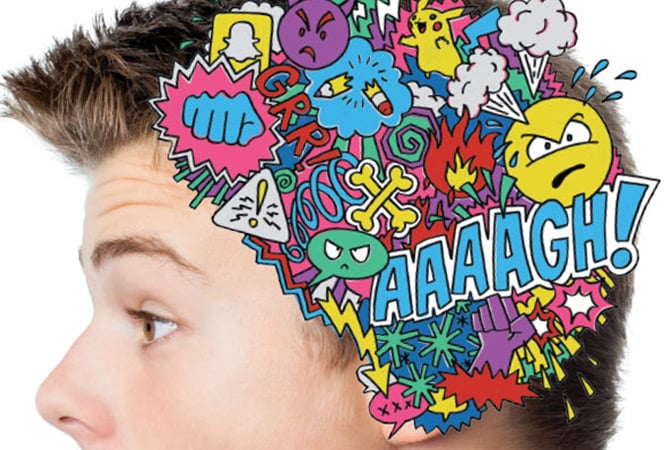 Colorful illustrations over a boy&apos;s head